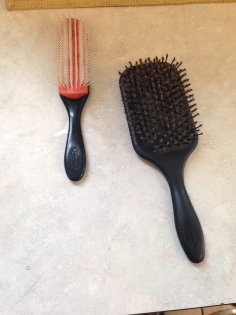 My beloved Denman paddle and blow dry brush.